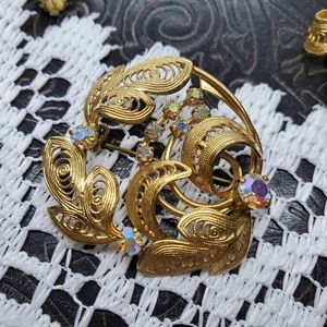 Gold tone and rhinestones brooch and earrings set